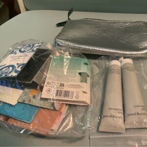 Ulta bag mixed brand name samples Cosmetic bag Living Proof Travel shampoo